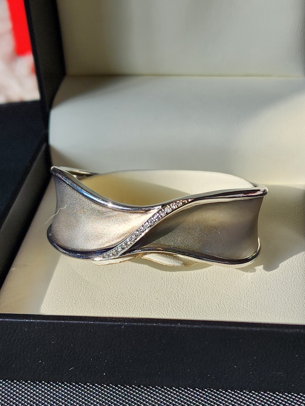 Elegant Silver-Tone Wave Cuff Bracelet with Diamond Accent